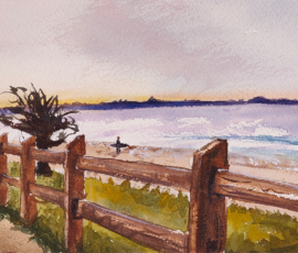 Last Set Byron Bay Main beach. Surfer getting the last set in before the sun goes down.