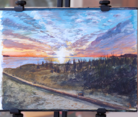 South Durras Sunset Watercolour painting in small sketchbook capturing the blue purple yellow and orange of a tranquil sunset going down over a steel ocean horizon.